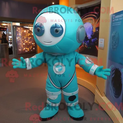 Produktbild von Maskottchen REDBROKOLY eines türkisfarbenen Astronauten mit Minirock und Wickelrock