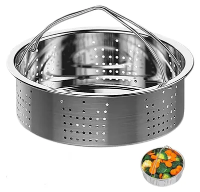 A stainless steel steamer basket with handles, shown from a slightly elevated angle. A small inset image shows the basket filled with vegetables.