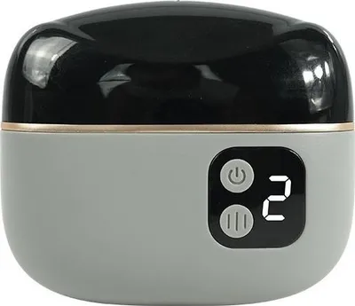 A close-up, front-facing view of a gray and black electric nail trimmer and polisher.