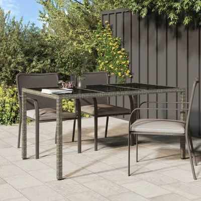 Obrázek produktu pro The Living Store zahradní stůl 150x90x75 cm z tvrzeného skla a polyratanu šedý