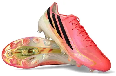 Immagine prodotto di Scarpe da calcio Adidas F50 Hyperfast Elite, adatte a superfici sintetiche, unisex, nei colori "Solar Turbo/Core Black/Gold Metallic"