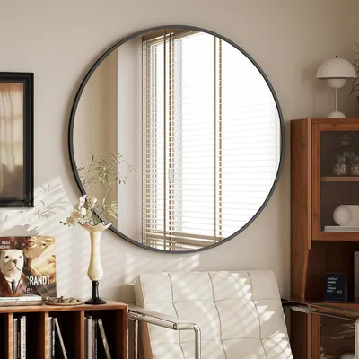 Productafbeelding van Spiegel in de vorm van een rund, 76 cm, zwart, met een aluminium frame. Breekvaste constructie, geschikt om op te hangen en tegen een muur te leunen