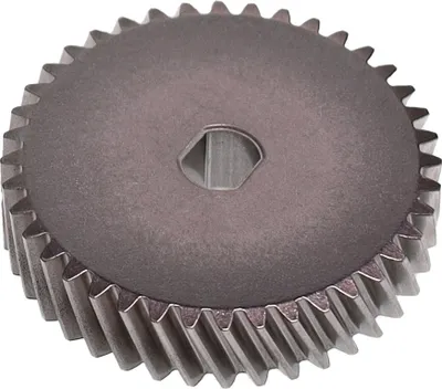 A close-up, isolated shot of a metal gear with a hexagonal center hole.