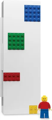 A white pencil case with Lego-style building blocks attached and a Lego minifigure next to it.