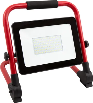 A portable LED work light with a red metal frame and a black housing for the light panel.
