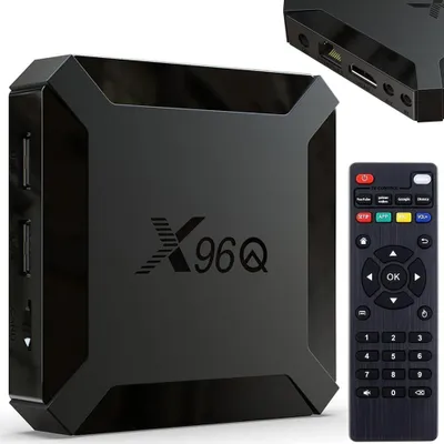 A black smart TV box and its remote control are displayed on a white background.