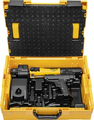 A yellow plastic case with black foam lining, containing a black and yellow power tool and its charger.