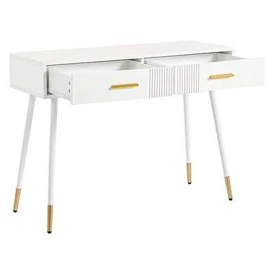 A white vanity table with two drawers, one of which is open, and gold accents on the handles and legs.