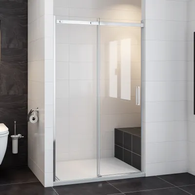 A modern bathroom with a sliding shower door.