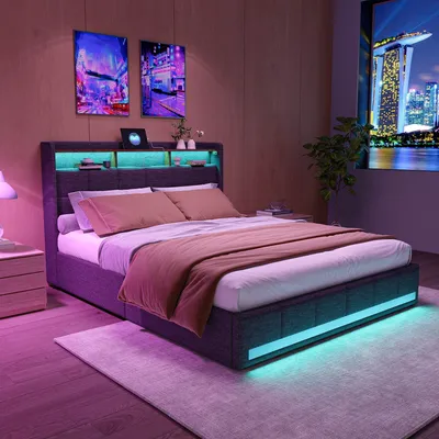 A bedroom scene with a bed, nightstand, and artwork, illuminated by LED lights.