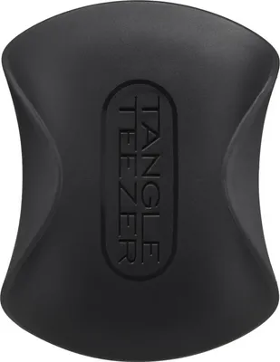 A black Tangle Teezer scalp exfoliator and massager is shown from a top-down perspective on a white background.