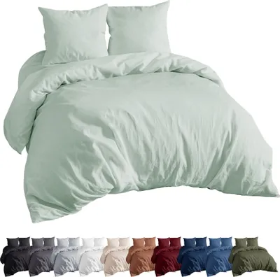 A mint-colored duvet cover and pillow set is displayed against a white background, with a row of different colored duvet covers and pillow sets shown below.
