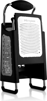 A studio shot of a Microplane four-sided grater.