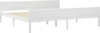 A white wooden bed frame with a slatted base, shown from a side angle against a white background.