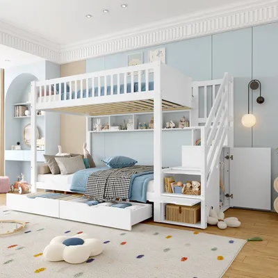 A white bunk bed with a pull-out trundle bed in a child's bedroom.