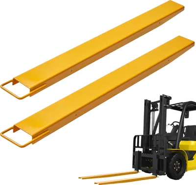 Two yellow forklift extensions are shown in the foreground, with a yellow and black forklift in the background.