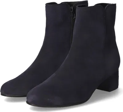 A pair of navy blue suede ankle boots with block heels are shown against a white background.