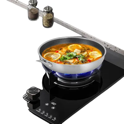 Immagine prodotto di Padella, realizzata in acciaio inossidabile di alta qualità, con rivestimento antiaderente resistente ai graffi, diametro 32 cm