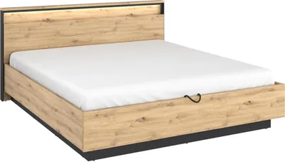 A bed with a wooden frame and a white mattress.