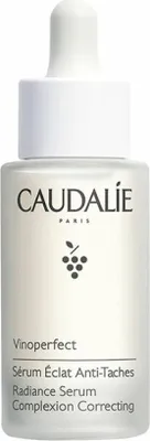 A product shot of a Caudalie Vinoperfect Radiance Serum bottle.