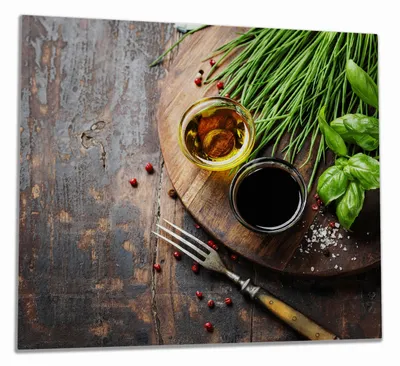 Produktbild von Wallario Herdabdeckplatte aus Glas, Größe 60 x 52 cm 1-teilig, Motiv Kräuter, Öle und Gewürze auf einem Holzbrett