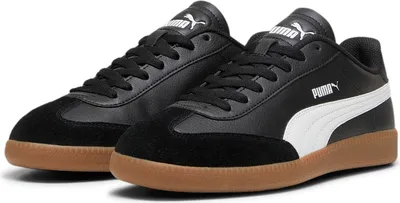 A pair of black Puma sneakers with white accents and a brown sole, displayed against a white background.