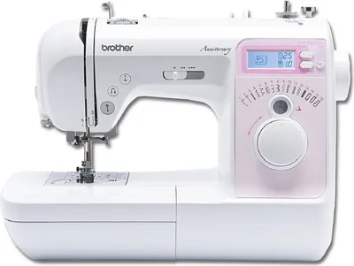 A white Brother sewing machine with pink accents, shown from the front-left.