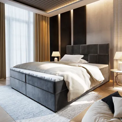 A bedroom scene featuring a large bed with bedding, bedside tables, and curtains.