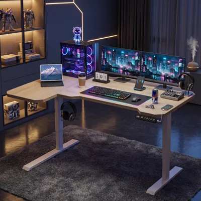 A modern gaming or home office setup with an L-shaped standing desk, multiple monitors, a computer tower, and various accessories.