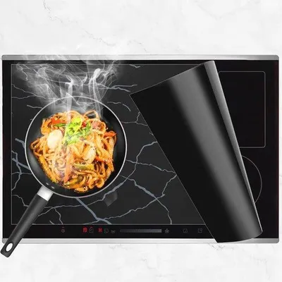 Produktbild von Induktionsschutzmatte 52 x 78 cm – Rutschfeste Kochfeldschutzmatte aus Silikon