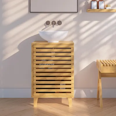 A bathroom vanity with a sink and cabinet.