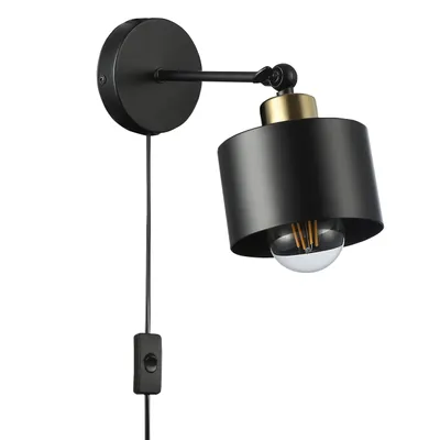 A black and copper wall lamp with an exposed light bulb is shown against a white background.