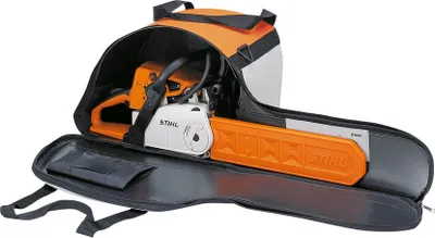 A Stihl chainsaw is shown inside its carrying case.