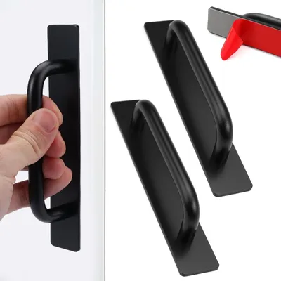 Immagine prodotto di Maniglia per mobili autoadesiva - Nero - 147 x 25 x 32 mm - Set da 2 pezzi - Per armadi e cassetti