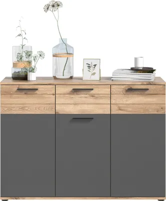 A modern sideboard with wooden top drawers and gray cabinet doors, decorated with vases of flowers and a framed picture.