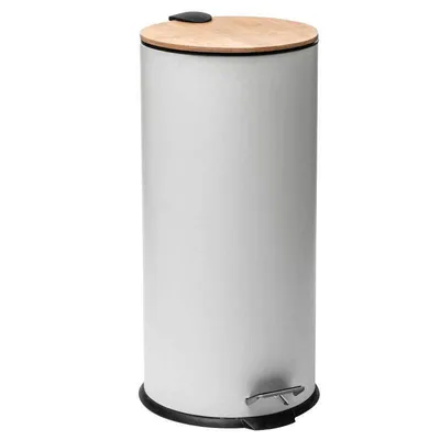 A white pedal bin with a bamboo lid and a silver pedal.