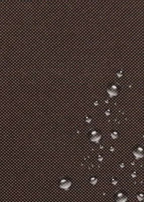 A close-up of a brown textured fabric with water droplets on it.