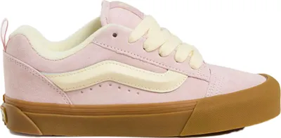 A side view of a single pink Vans Knu Skool sneaker with cream accents and a gum sole, isolated on a white background.