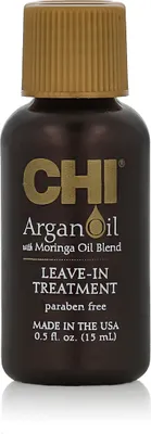 A small bottle of hair treatment product.