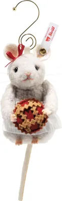 A Steiff mouse ornament holding a pie, with a tag attached.