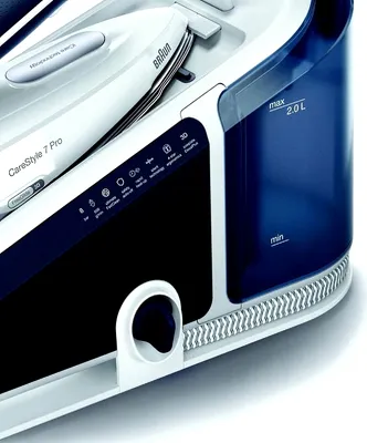 Close-up of a Braun CareStyle 7 Pro steam ironing station, focusing on the water tank and control panel.