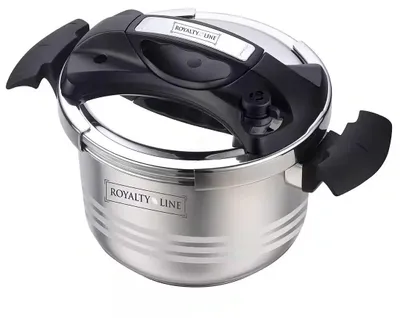 A stainless steel pressure cooker with black handles and lid.