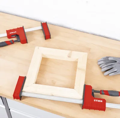 Produktbild von STIER Korpuszwinge, 1200 mm Spannweite, 95 mm Ausladung, 6000 N Spannkraft, aus duktilem Gusseisen, Spannwerk