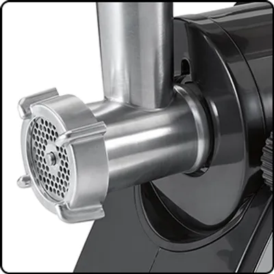 Close-up of a meat grinder attachment.