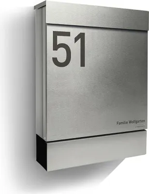 A modern, brushed stainless steel mailbox with the number 51 prominently displayed on the front.