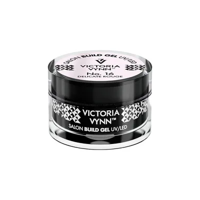A product shot of a Victoria Vynn nail gel in a clear jar with a black lid.