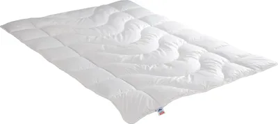 A white duvet is shown on a white background.