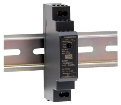 A black DIN rail power supply unit is mounted on a metal DIN rail.