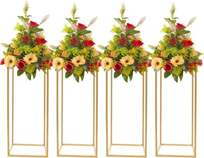 Four golden flower stands with floral arrangements on a white background.
