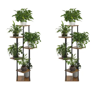Two identical multi-tiered plant stands filled with green plants, presented against a white background.
